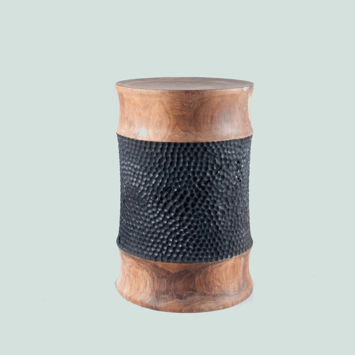 Allu Dot Stool made from solid teak wood with hammered black metal accent. Perfect as a side table or stool